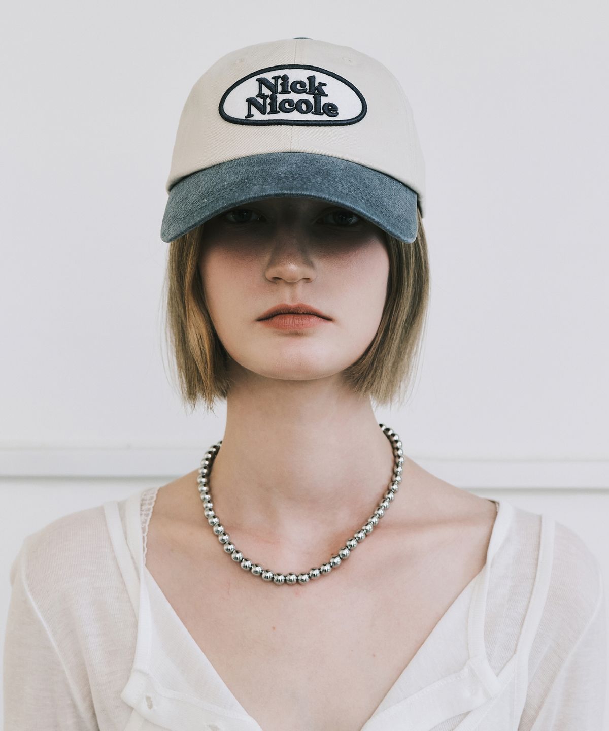 닉앤니콜(NICK&NICOLE) OVAL WAPPEN BALL CAP_TWOTONE CHARCOAL