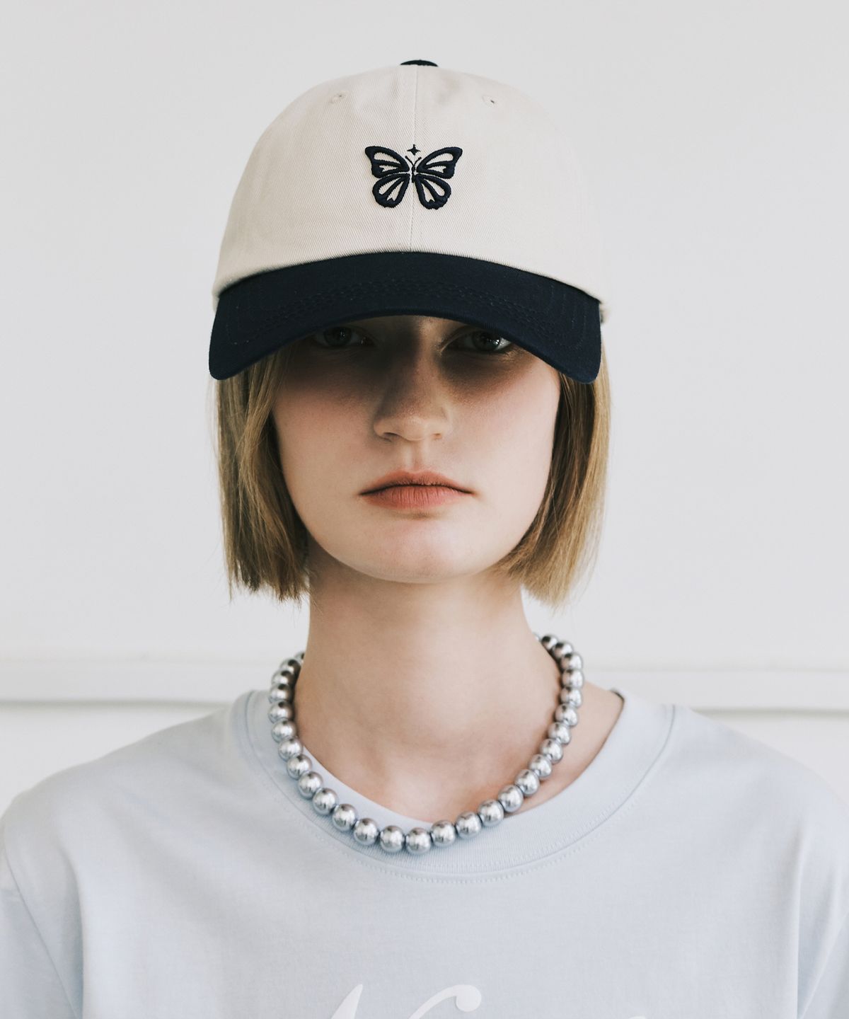 닉앤니콜(NICK&NICOLE) MINI BUTTERFLY BLINK BALL CAP_TWOTONE NAVY