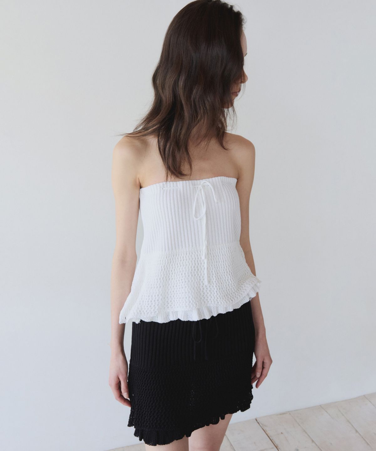 이어닝(YEARNING) LAYERED RUFFLE KNIT MINI SKIRT, BLACK