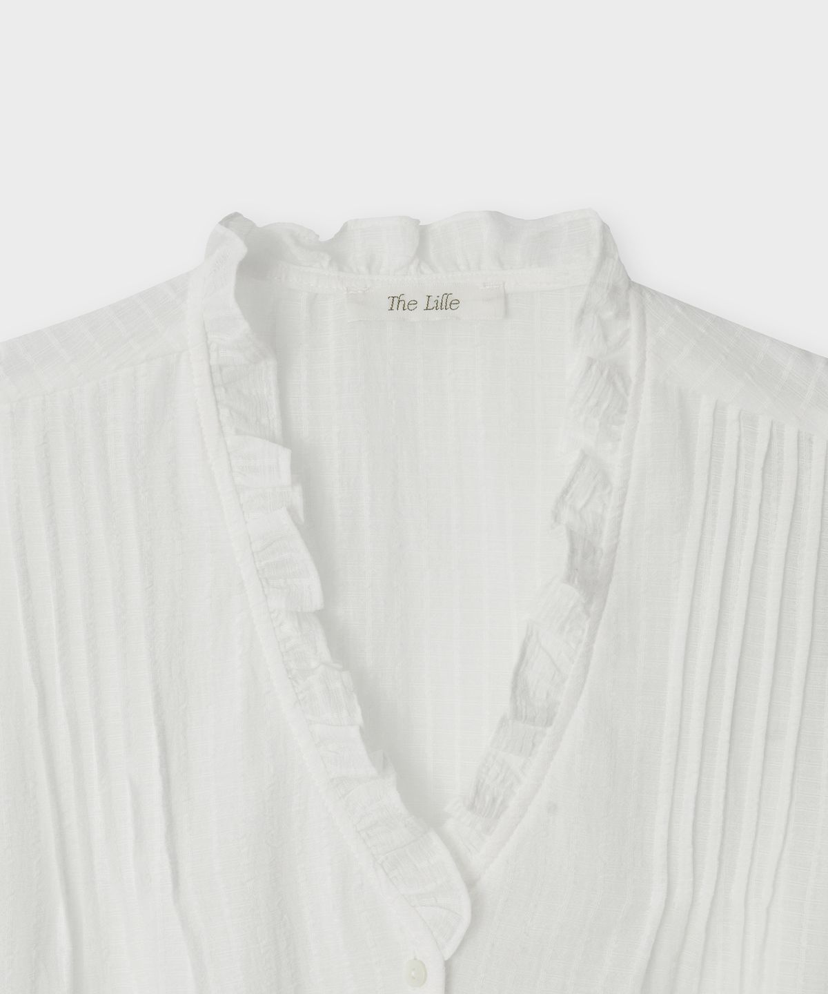 더 릴(THE LILLE) Bloom Frill Sleeveless Blouse_White