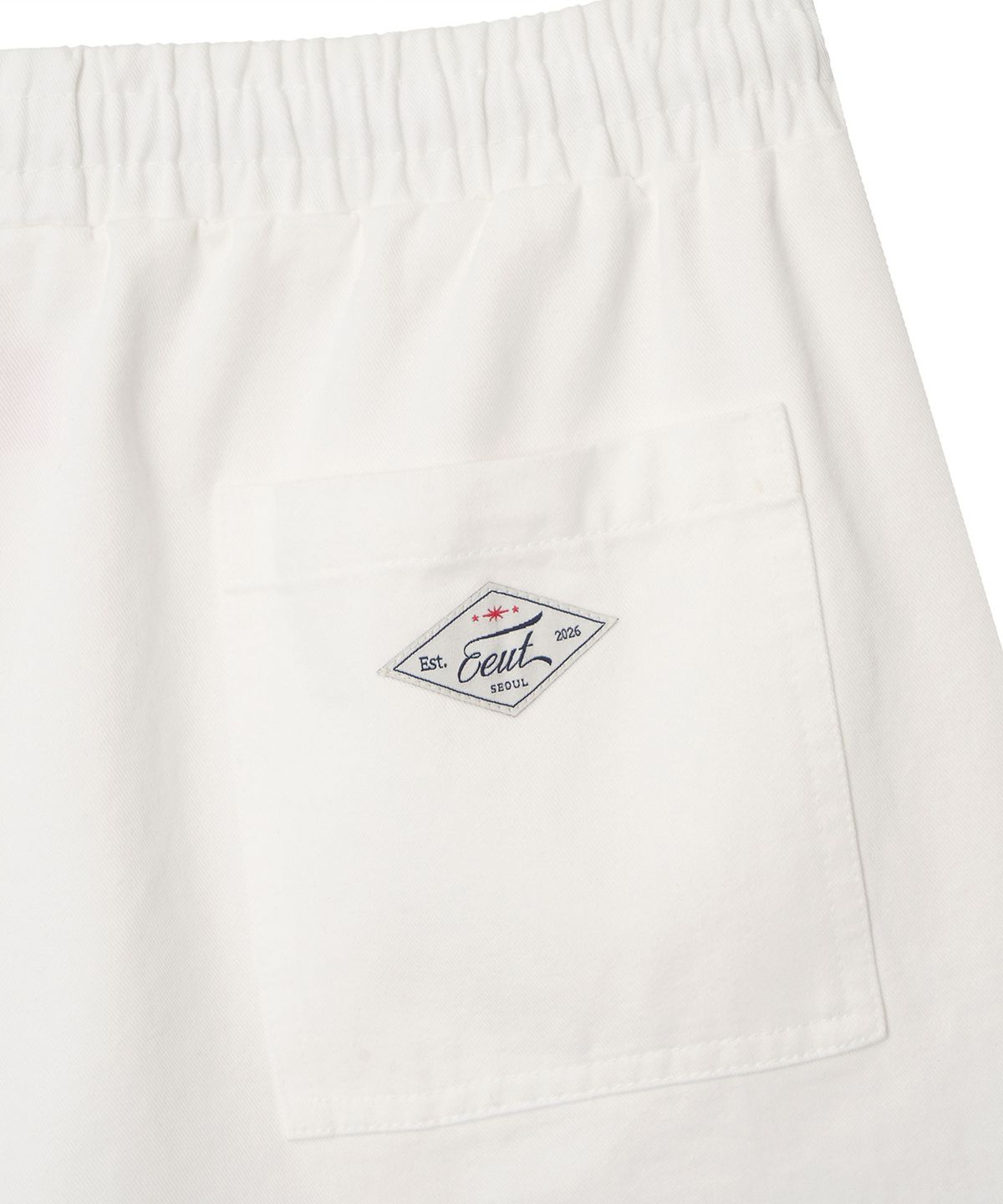 이우트(EEUT) WASHED COTTON BANDING SHORTS / IVORY