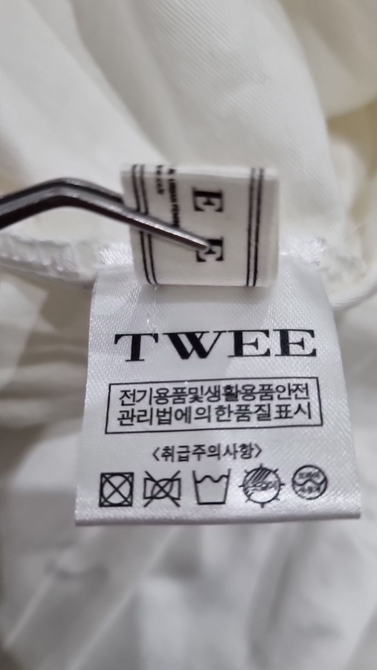 트위(TWEE) 나시/민소매 티셔츠