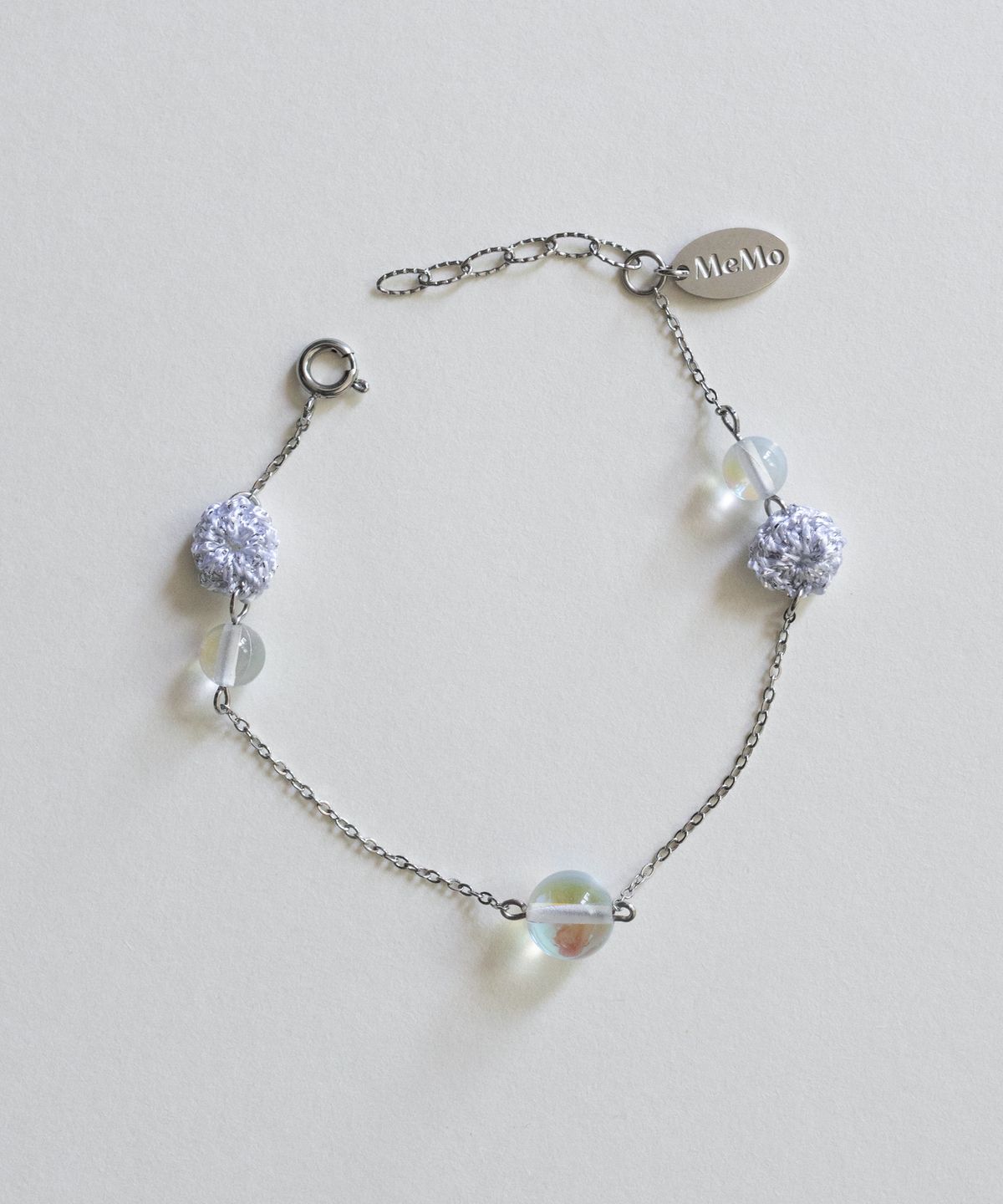 메리모티브(MERRYMOTIVE) Clear and silver point bracelet