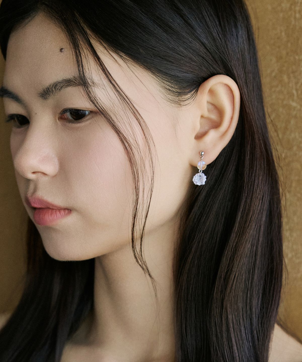 메리모티브(MERRYMOTIVE) Clear and silver drop earring