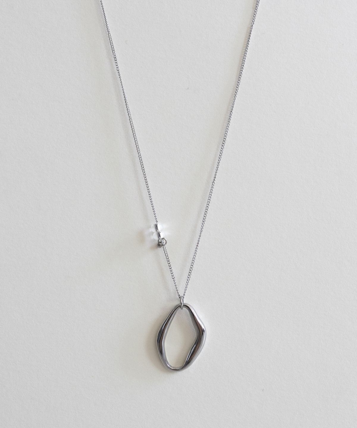 메리모티브(MERRYMOTIVE) Irregular shape pendant long necklace