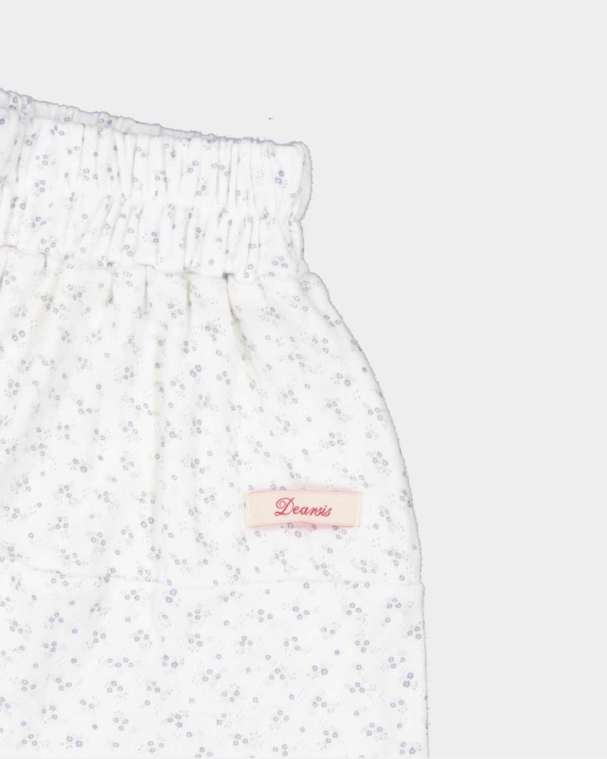 디어시스(Dearsis) Floral Punching Mini Skirt (White)