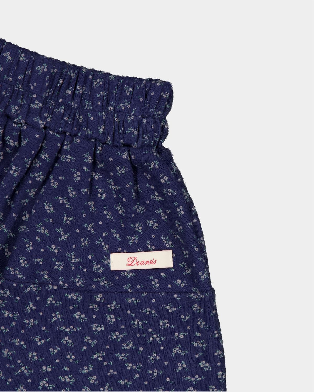 디어시스(Dearsis) Floral Punching Mini Skirt (Navy)