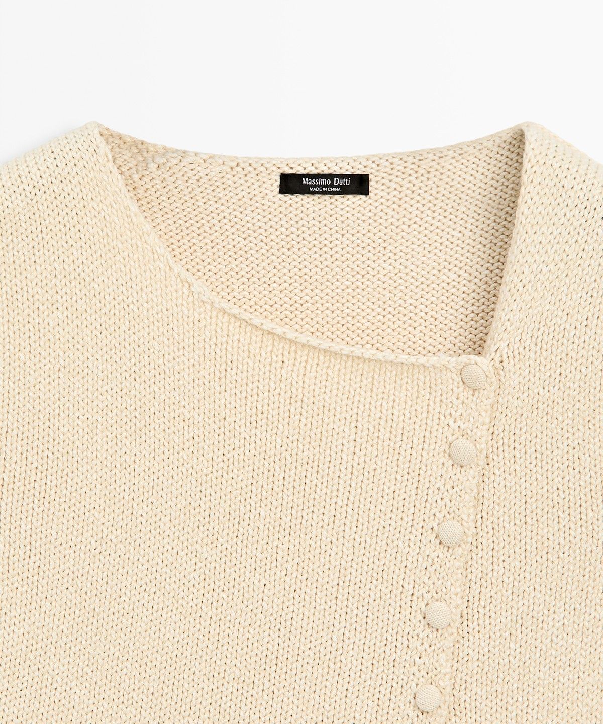 마시모두띠(MASSIMO DUTTI) 버튼 디테일 코튼 블렌드 니트 탑