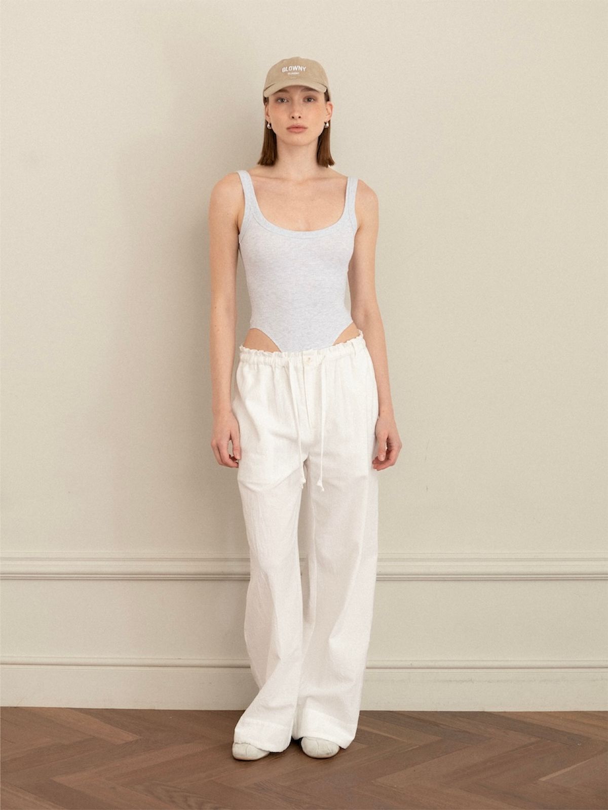 글로니(GLOWNY) G SCOOP NECK BODYSUIT (WHITE MELANGE)