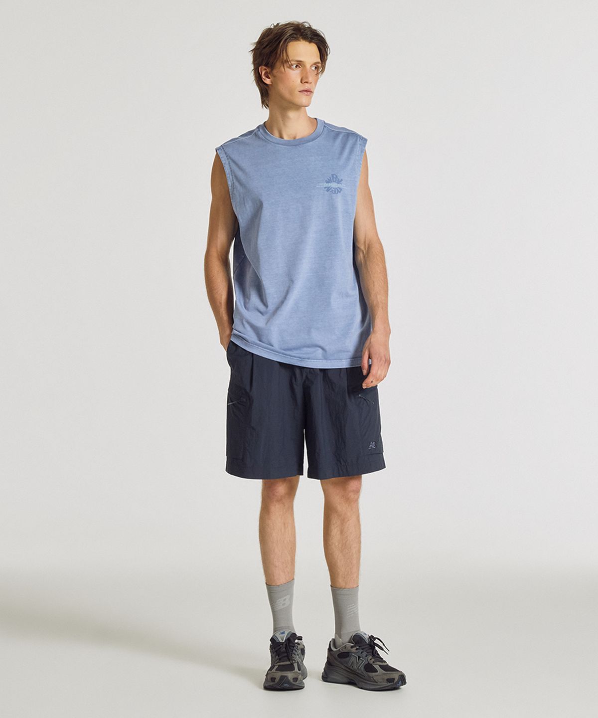 뉴발란스(NEW BALANCE) NBNGG3A023 / UNI Archive Pace Circle 그래픽 나시티 (G/BLUE)