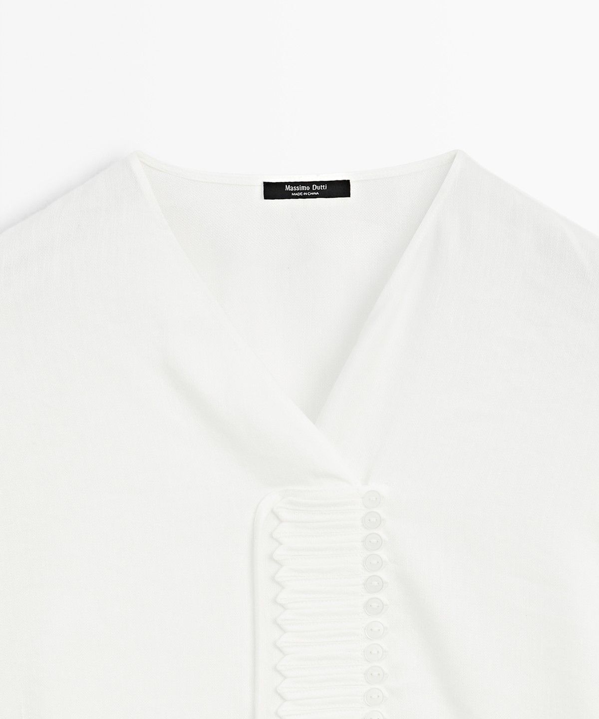 마시모두띠(MASSIMO DUTTI) 버튼 디테일 린넨 플루이드 블라우스