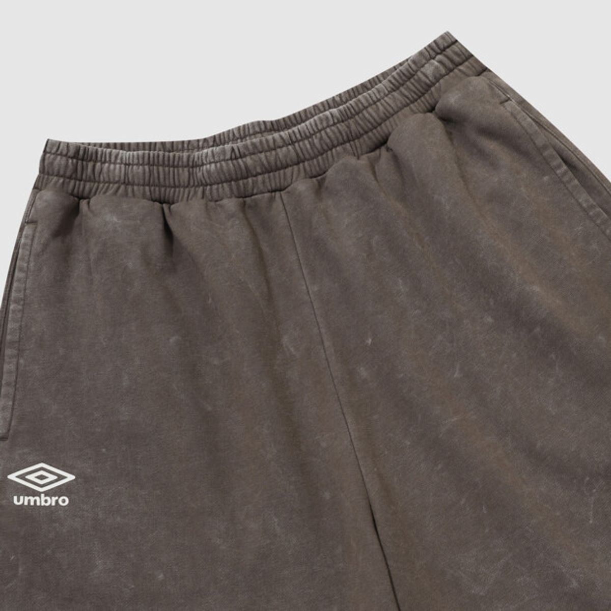 엄브로(UMBRO) 코맷 워시드 5부 벌룬핏 반바지 브라운 UR321CHP73