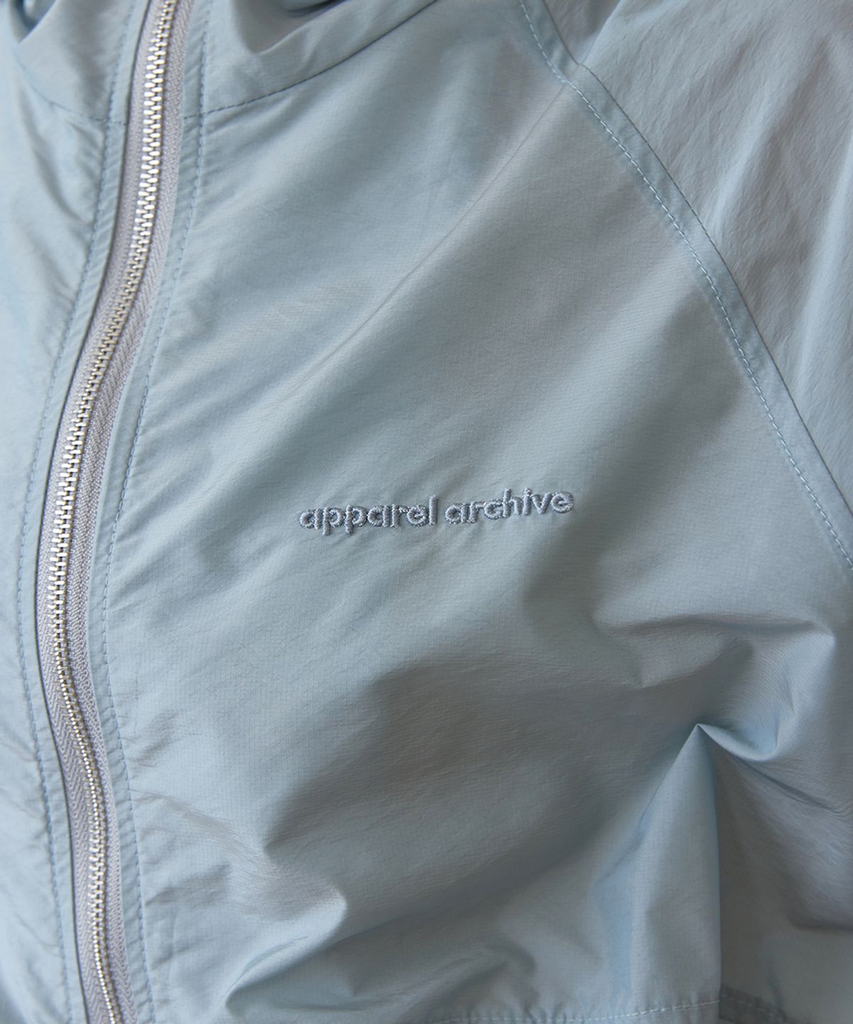 어패럴아카이브(APPAREL ARCHIVE) Lazy sheer nylon hoodie jumper - Skyblue