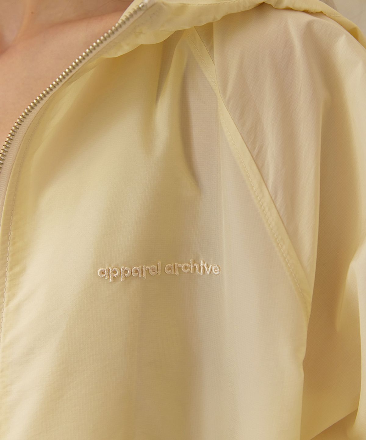 어패럴아카이브(APPAREL ARCHIVE) Lazy sheer nylon hoodie jumper - Butter