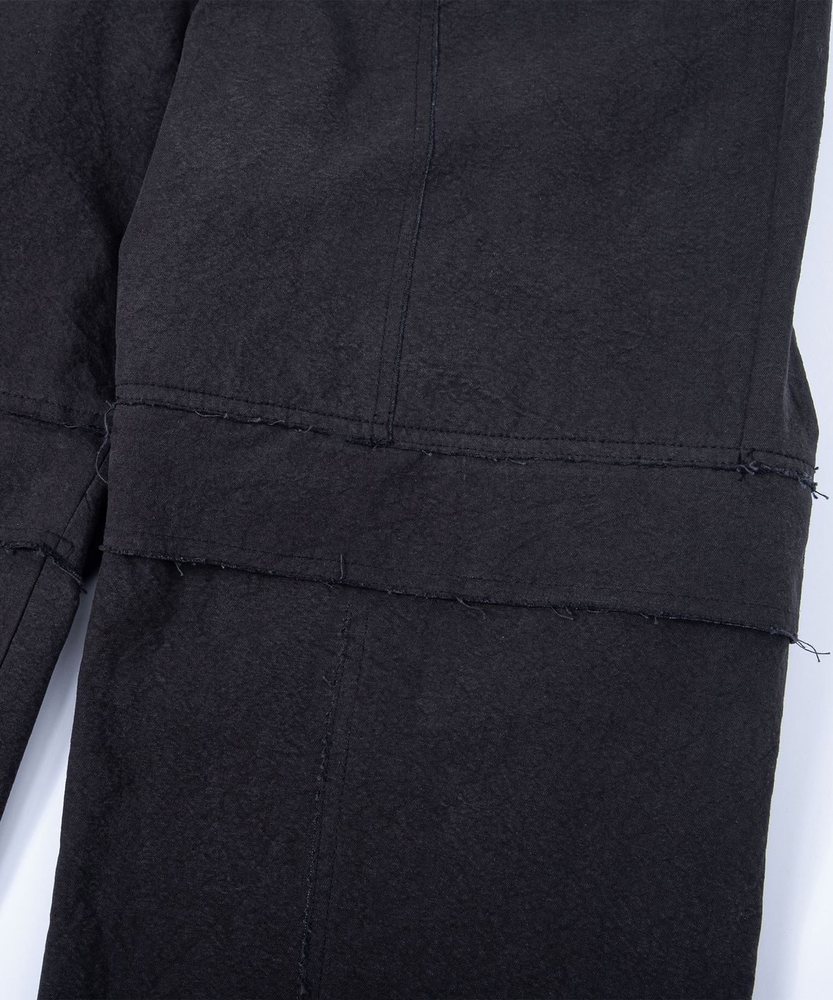 에이치직(H.JIK) Raw-edge Transformable Knee Zip Trousers - Dusty Black