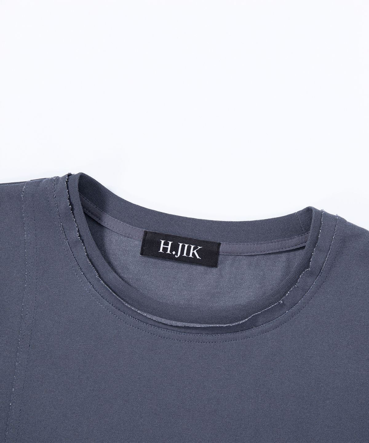 에이치직(H.JIK) Pigment Raw-edge Asymmetric Panel T-shirt -Dusty Blue