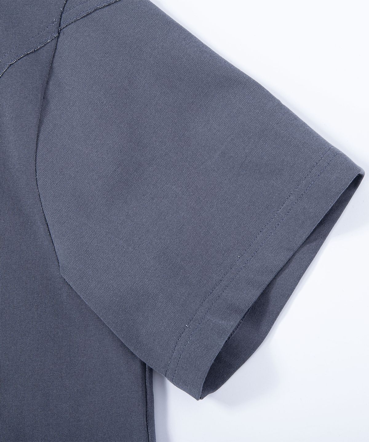 에이치직(H.JIK) Pigment Raw-edge Asymmetric Panel T-shirt -Dusty Blue