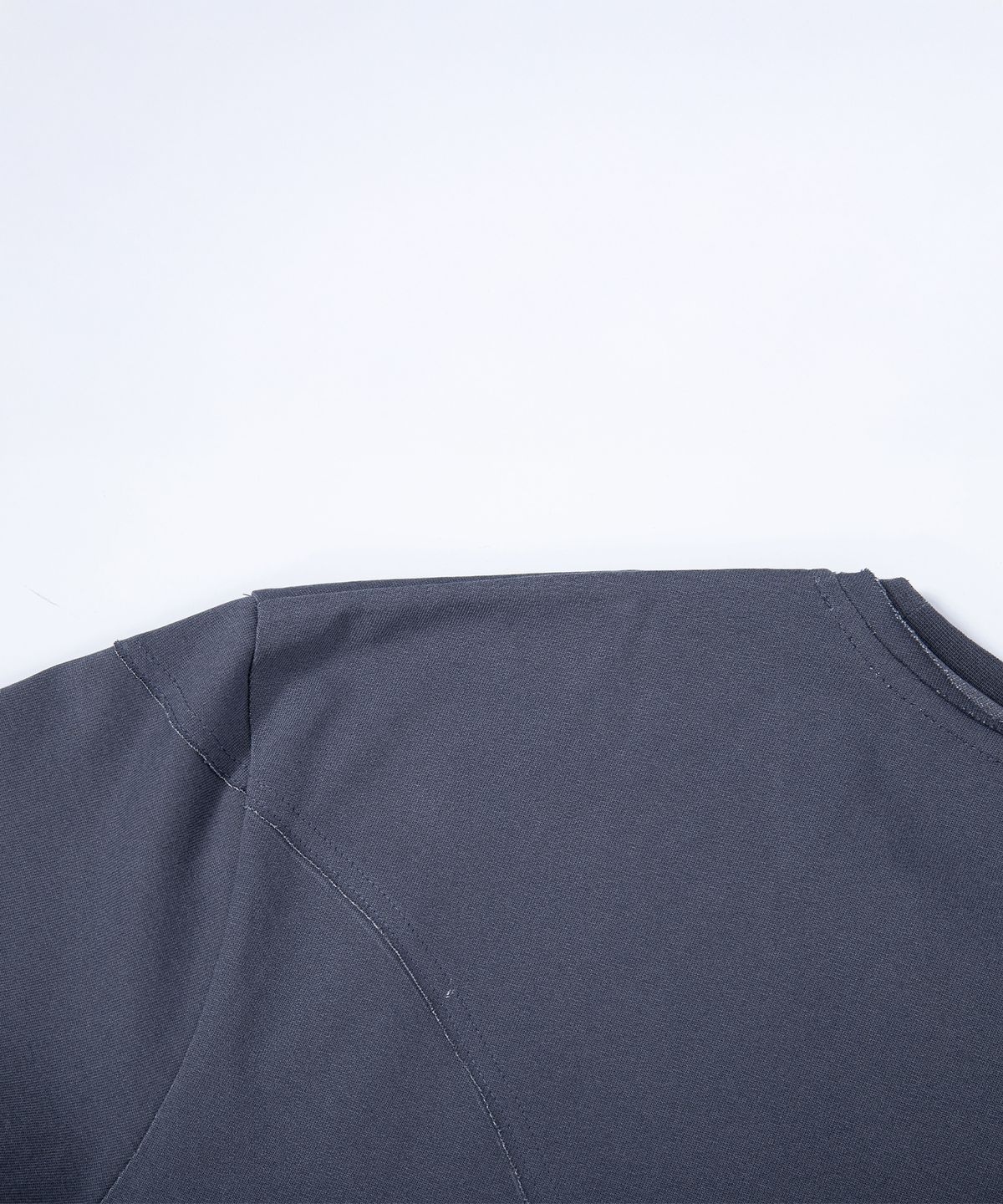 에이치직(H.JIK) Pigment Raw-edge Asymmetric Panel T-shirt -Dusty Blue