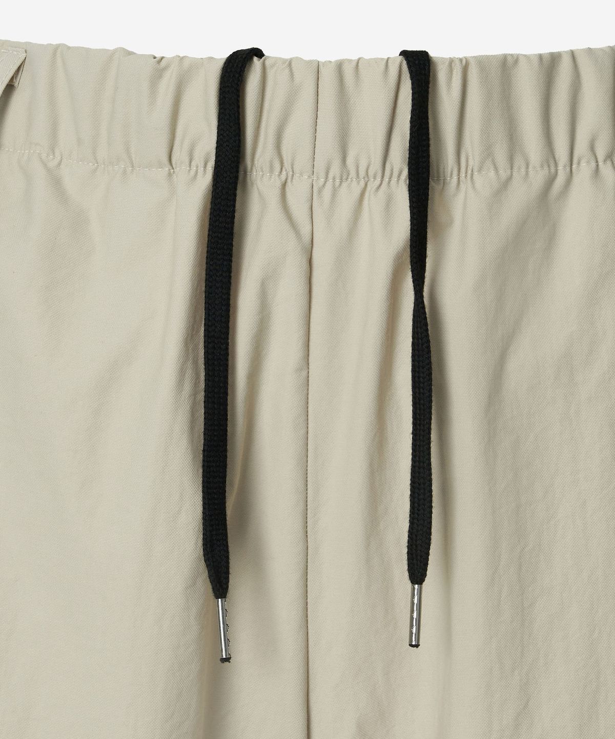 뉴얼린(NEWALRIN) Newalrin emblem nylon wide Pants Beige