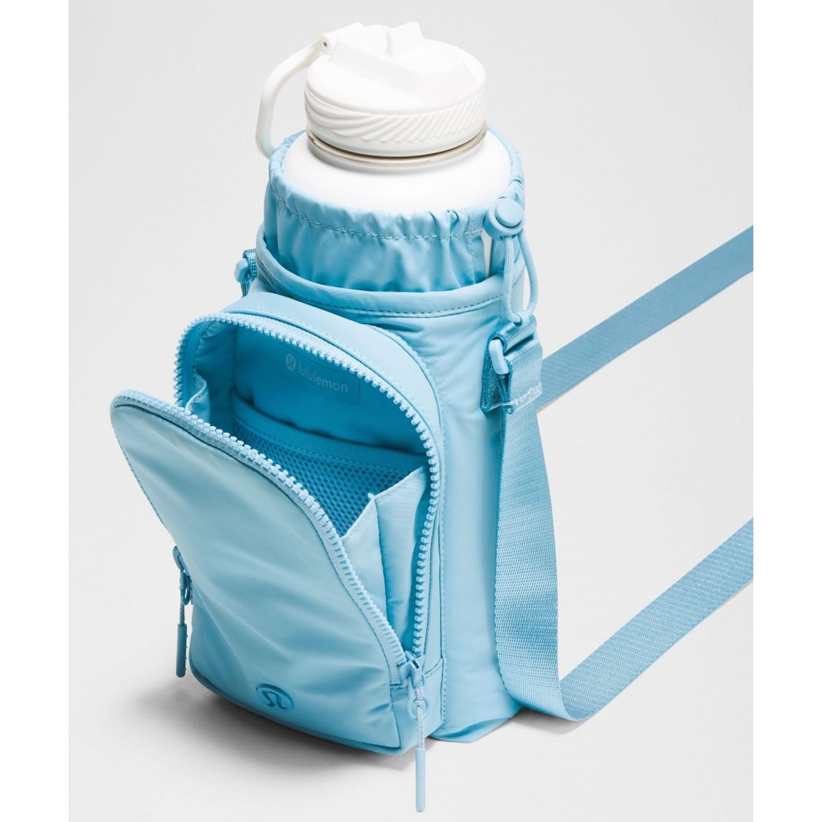 룰루레몬(LULULEMON) 워터보틀 크로스바디 위드 프런트 포켓 2L  SEAF