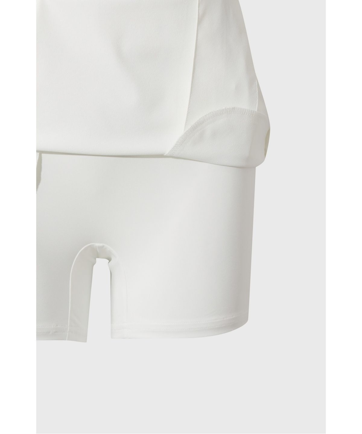 왁(WAAC) Unbalanced line pleats skort WWKCM26901IVX