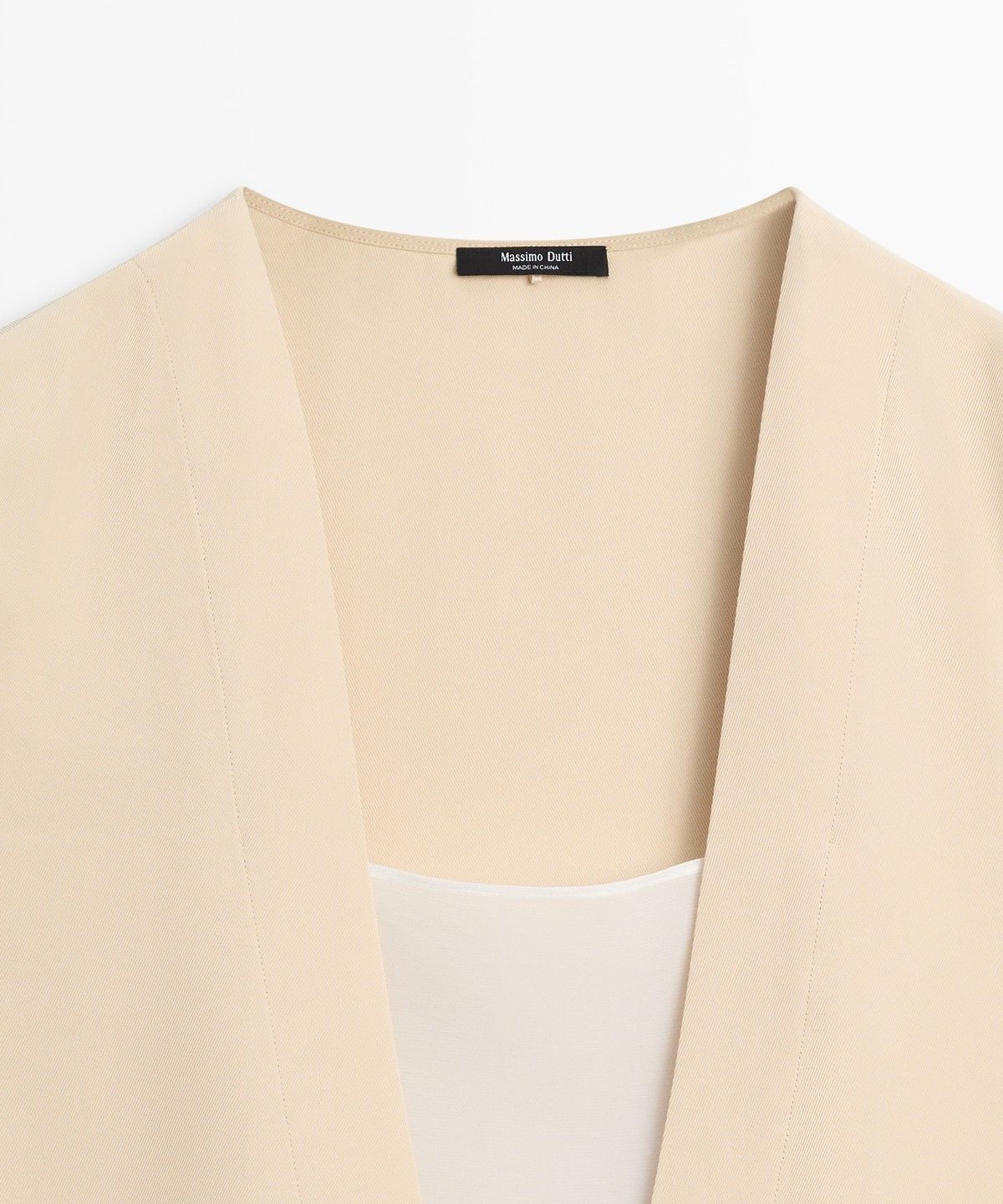 마시모두띠(MASSIMO DUTTI) 배색 디테일 플루이드 더블 레이어 톱