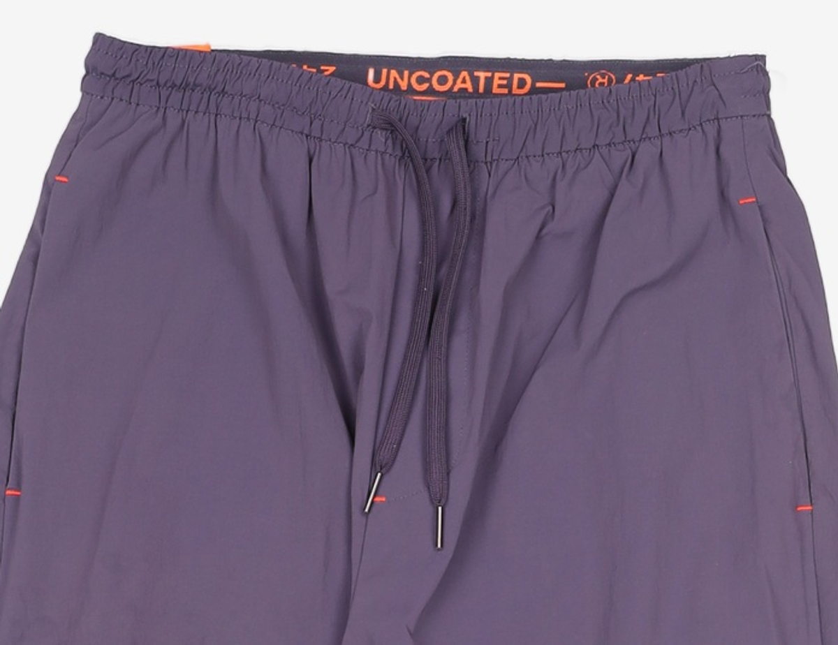 언코티드247(UNCOATED 247) 조거 팬츠 L
