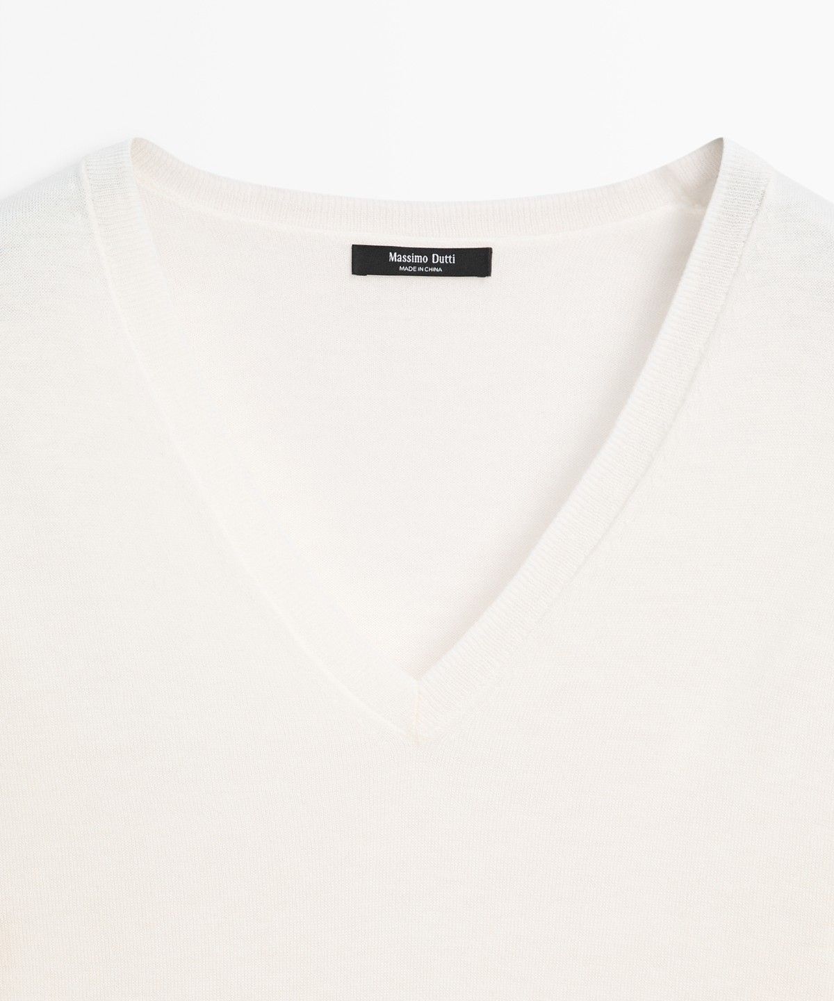 마시모두띠(MASSIMO DUTTI) 브이넥 니트 스웨터
