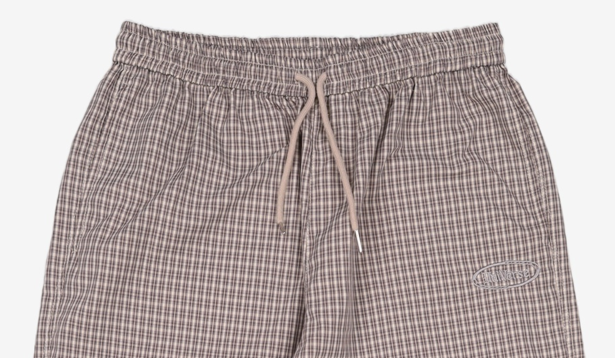 유니버스 가먼트(UNIVERSE GARMENT) 체크 파라슈트 팬츠_BROWN L