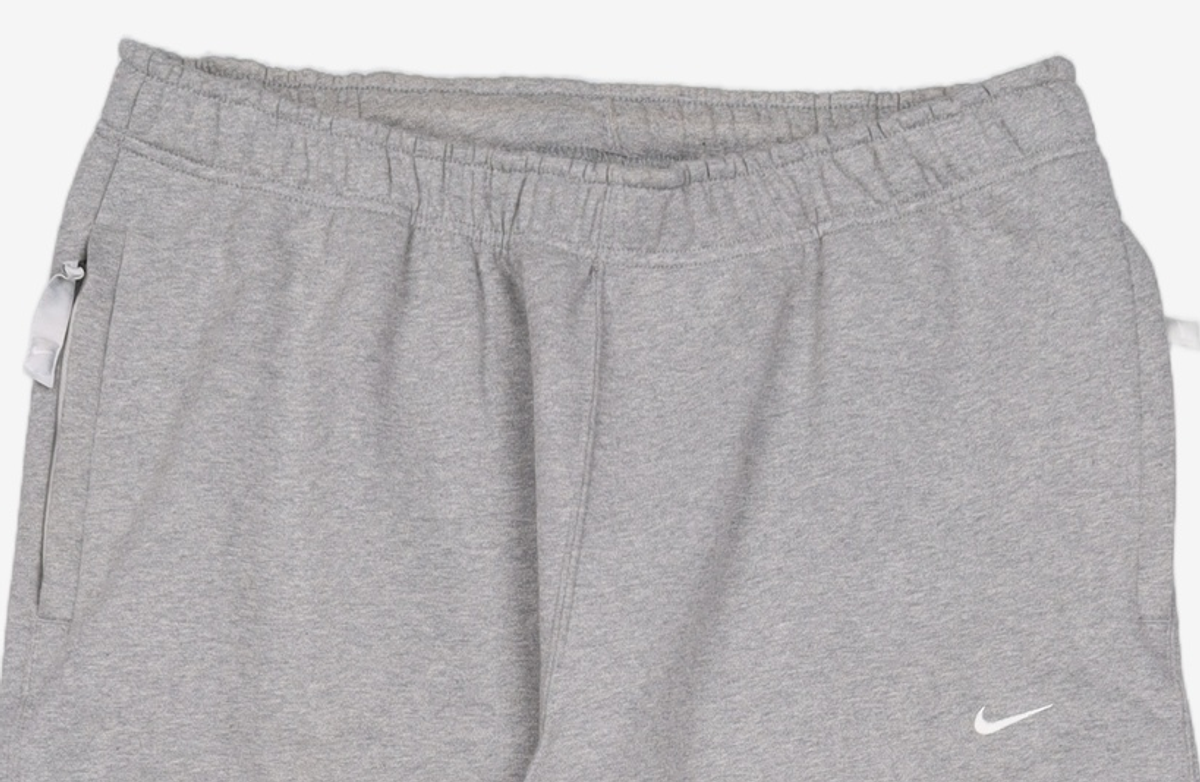 나이키(NIKE) 스포츠웨어 스우시 오픈 헴 플리스 팬츠 M - 다크 그레이 헤더:화이트 / FN3343-063 XXL
