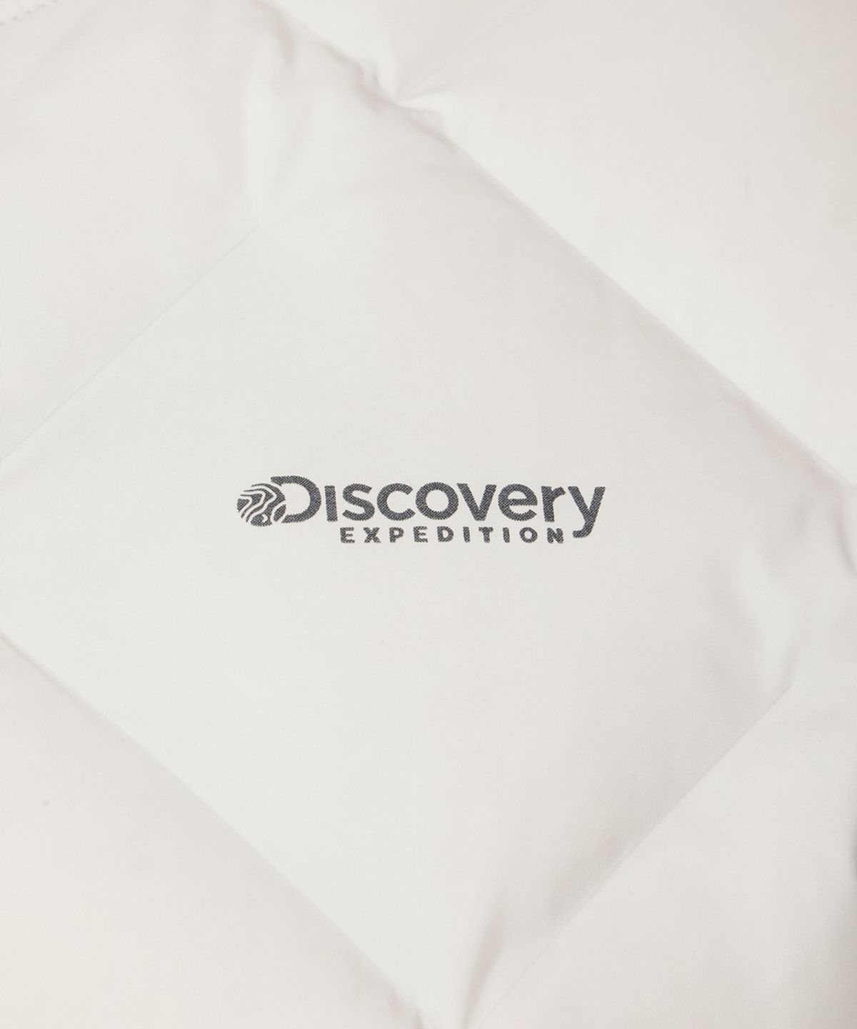 디스커버리 익스페디션(DISCOVERY EXPEDITION) 여성 디하스 튜브 다운 경량패딩 (IVORY)