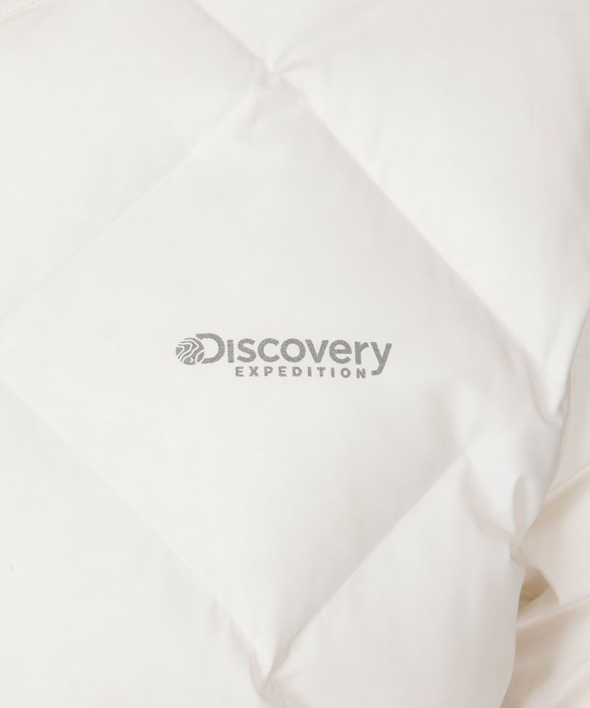 디스커버리 익스페디션(DISCOVERY EXPEDITION) 여성 디하스 U넥 튜브 다운 경량패딩 (CREAM)