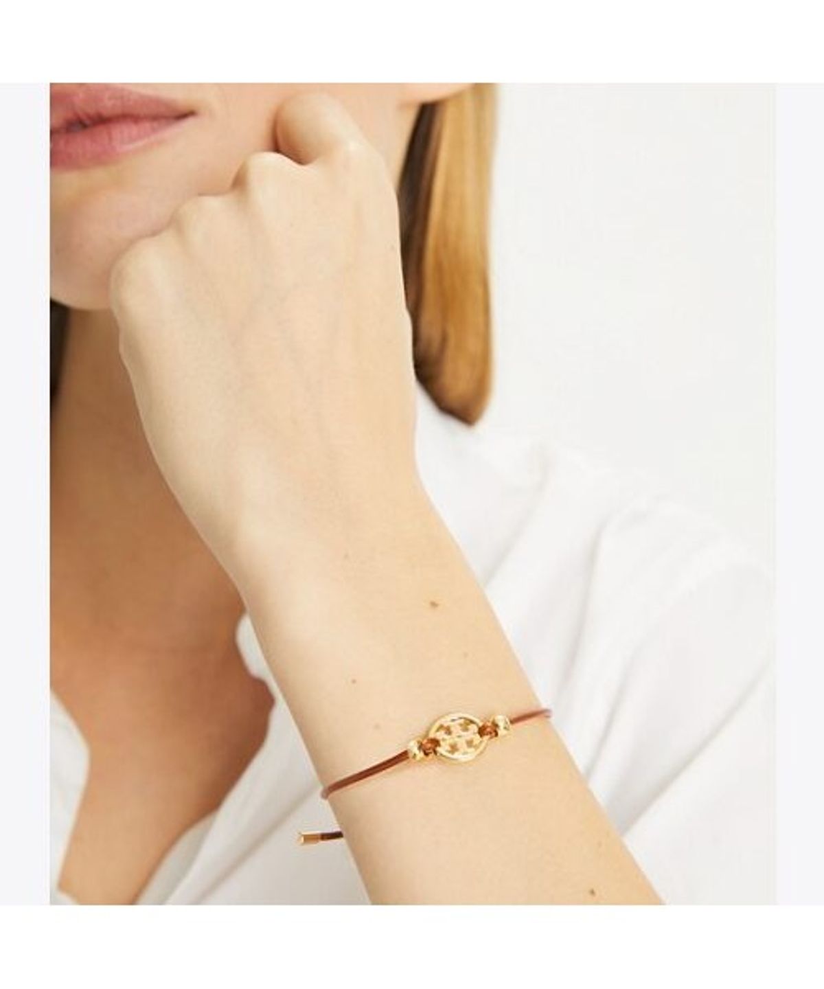토리버치(TORYBURCH) 아이콘 슬라이더 브레이슬릿 - 토리 골드 / 쿠오이오