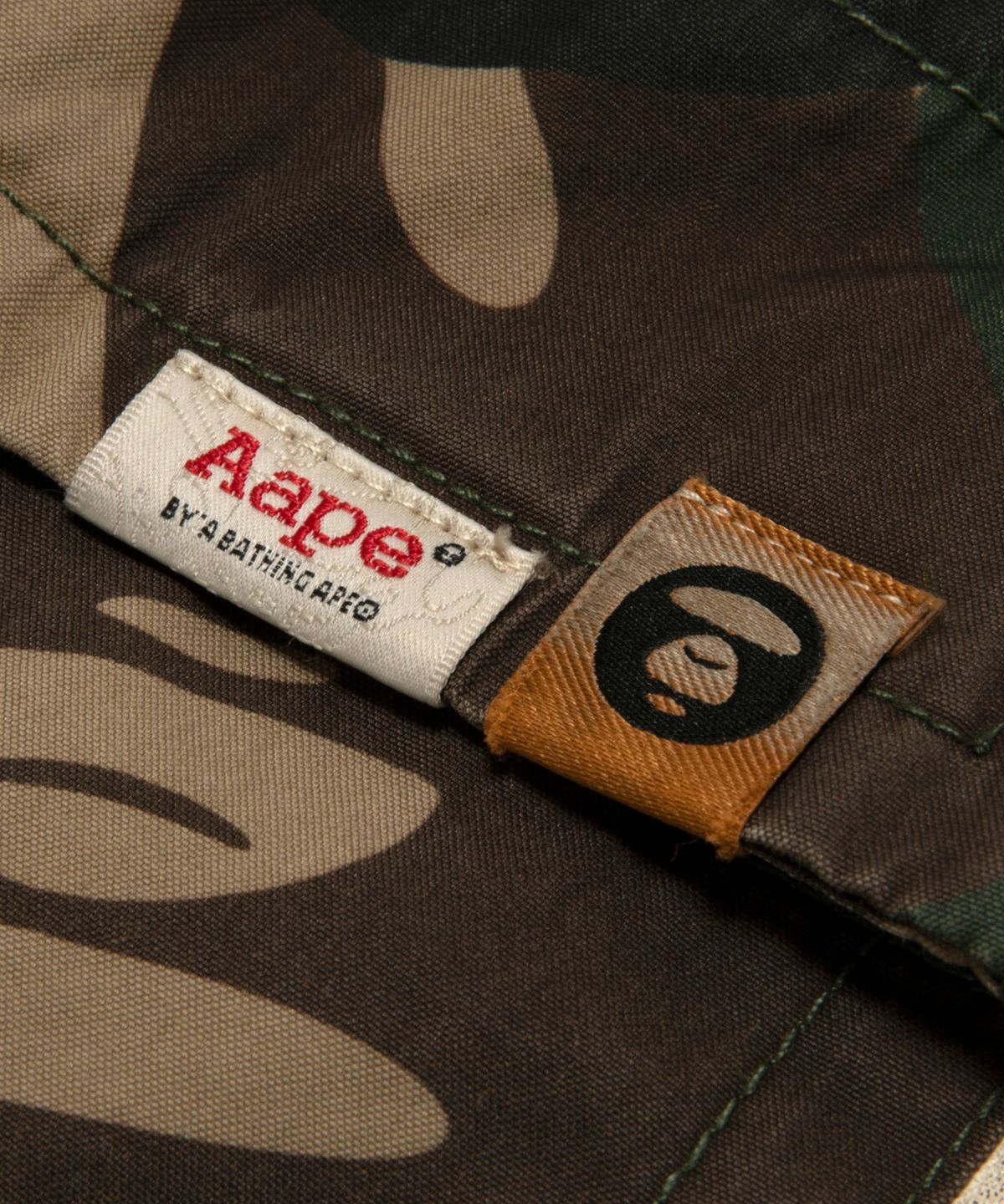 에이프(AAPE) AAPEUNVS 문페이스 카모 팬츠 그린 / AAPPTMD610XAQGRZ