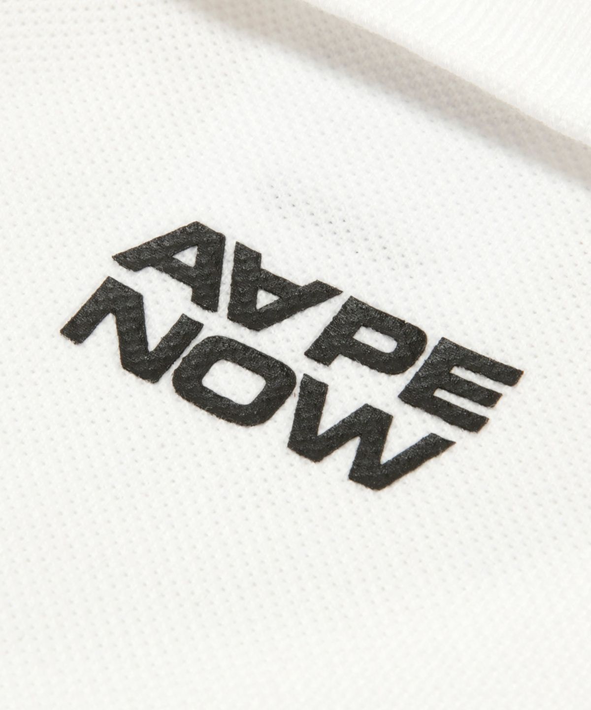 에이프(AAPE) AAPENOW 문페이스 로고 폴로 티셔츠 화이트 / AAPPOM1813XXQWHX