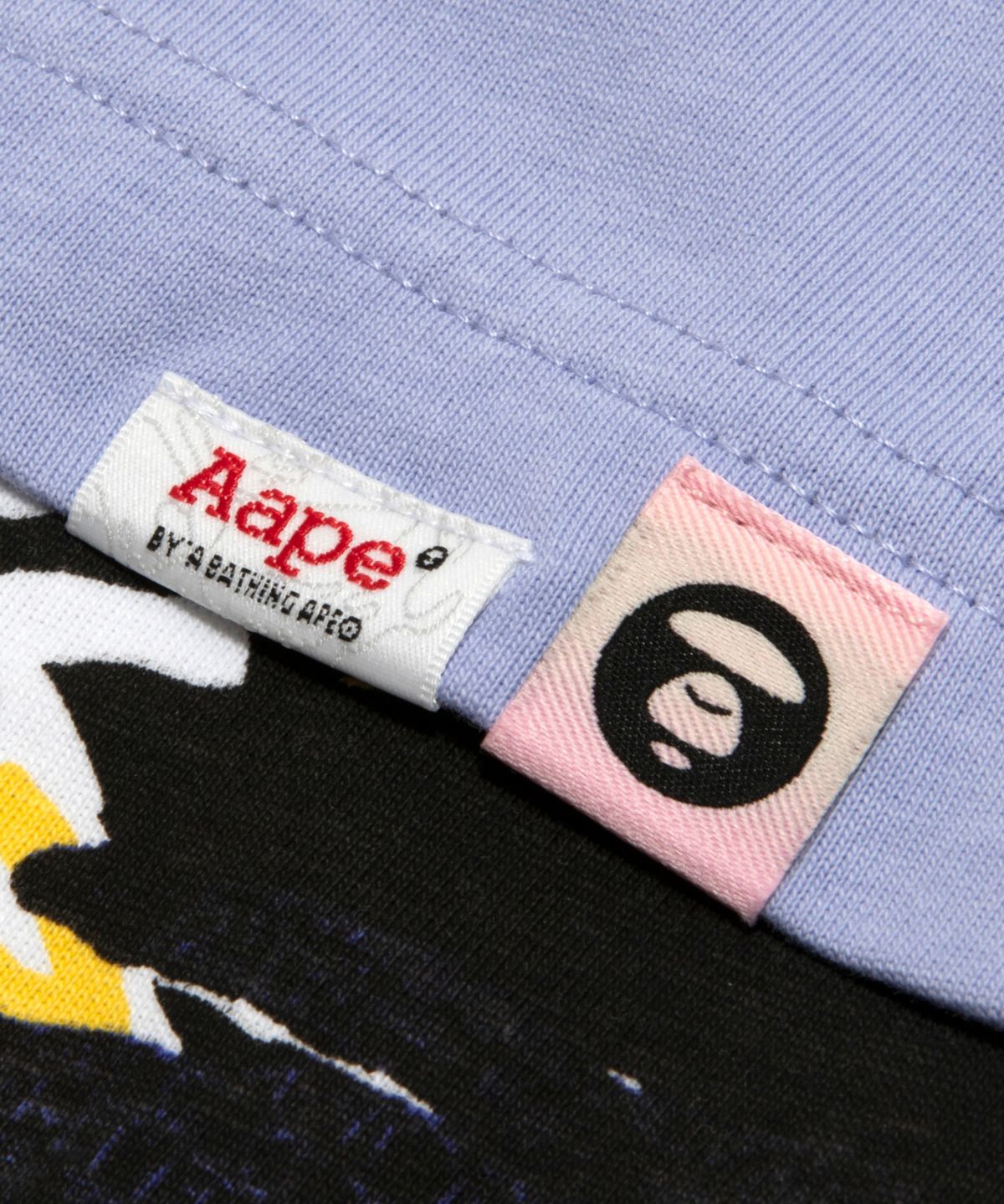 에이프(AAPE) 문페이스 티셔츠 퍼플 / AAPTEM1877XXQPPL