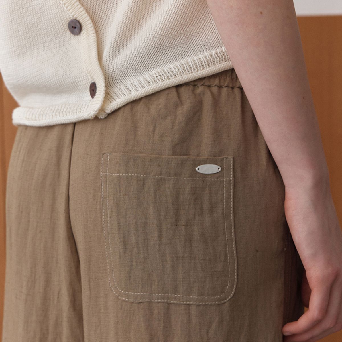 엘씨브이(LCVE) CURVED STITCH WIDE-FIT PANTS_BROWN