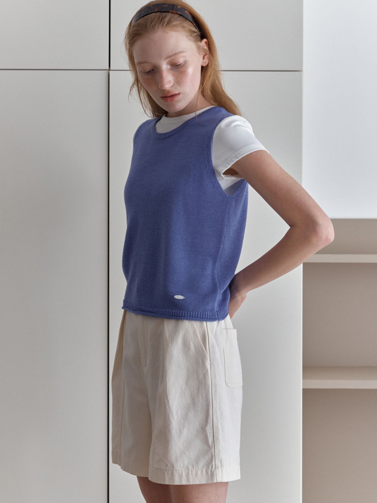 엘씨브이(LCVE) DIAGONAL BUTTONS SLEEVELESS KNIT_BLUE