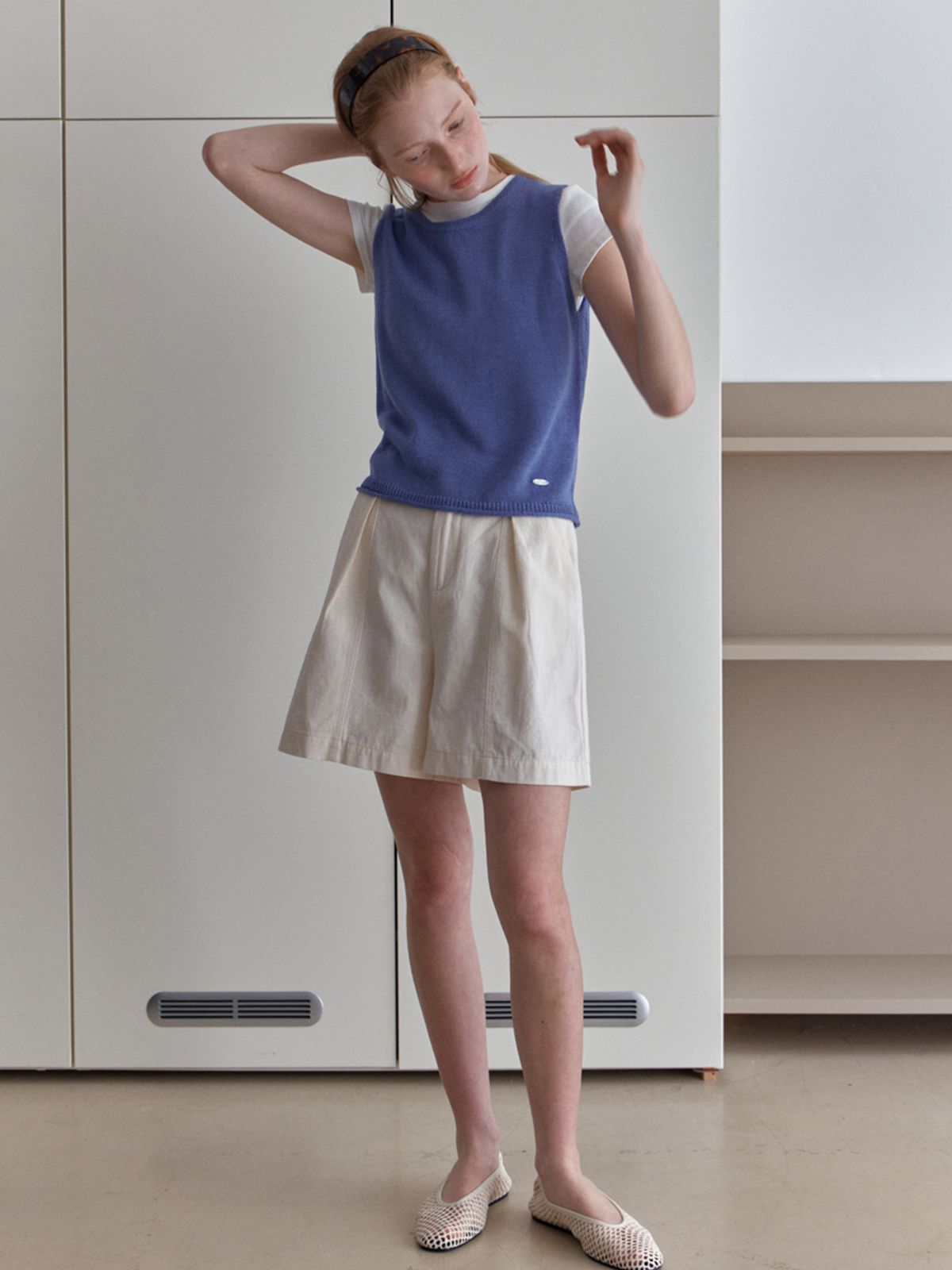 엘씨브이(LCVE) DIAGONAL BUTTONS SLEEVELESS KNIT_BLUE