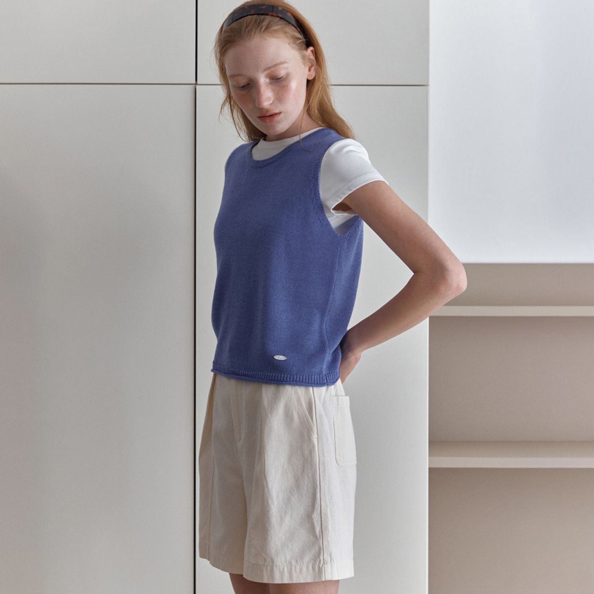 엘씨브이(LCVE) DIAGONAL BUTTONS SLEEVELESS KNIT_BLUE