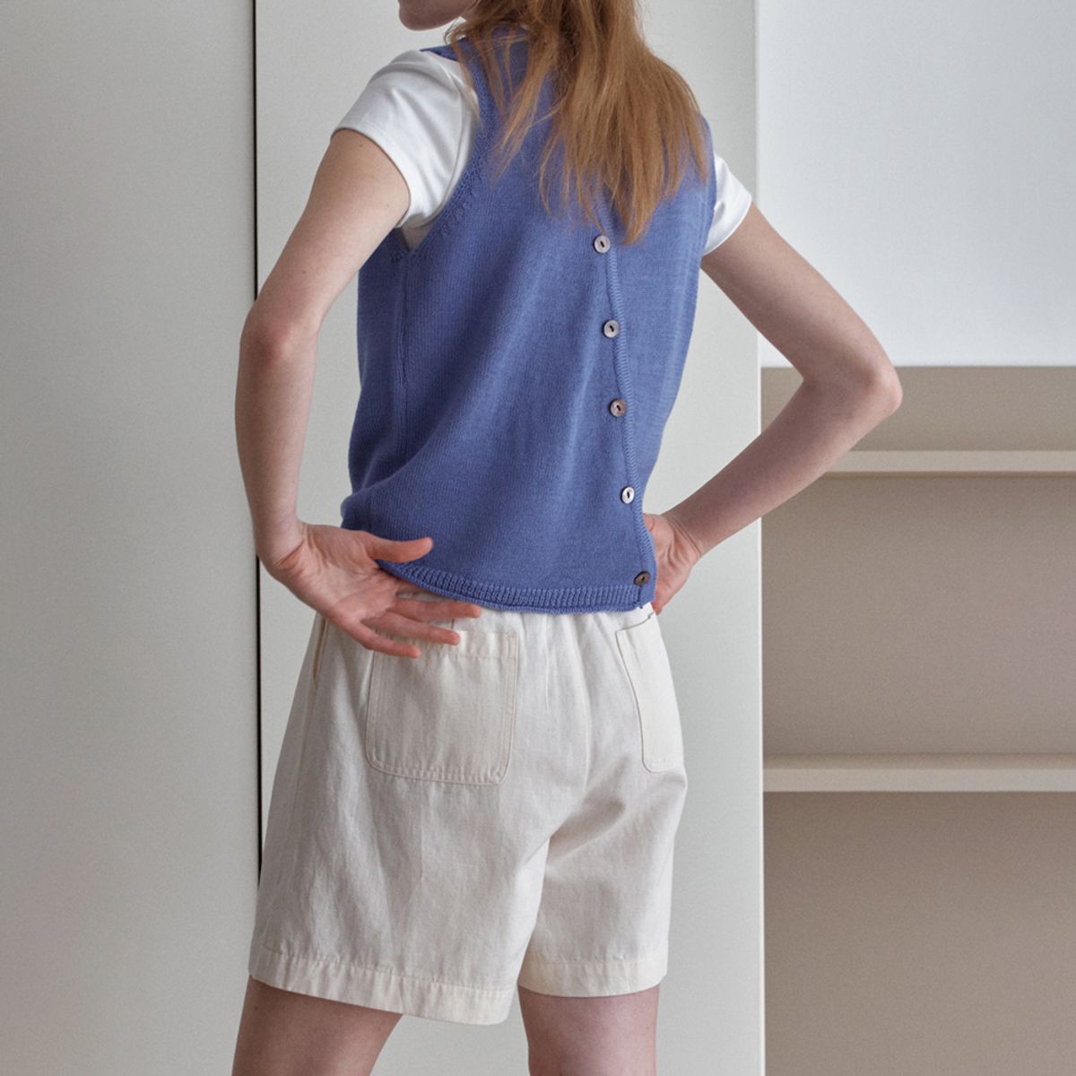 엘씨브이(LCVE) DIAGONAL BUTTONS SLEEVELESS KNIT_BLUE