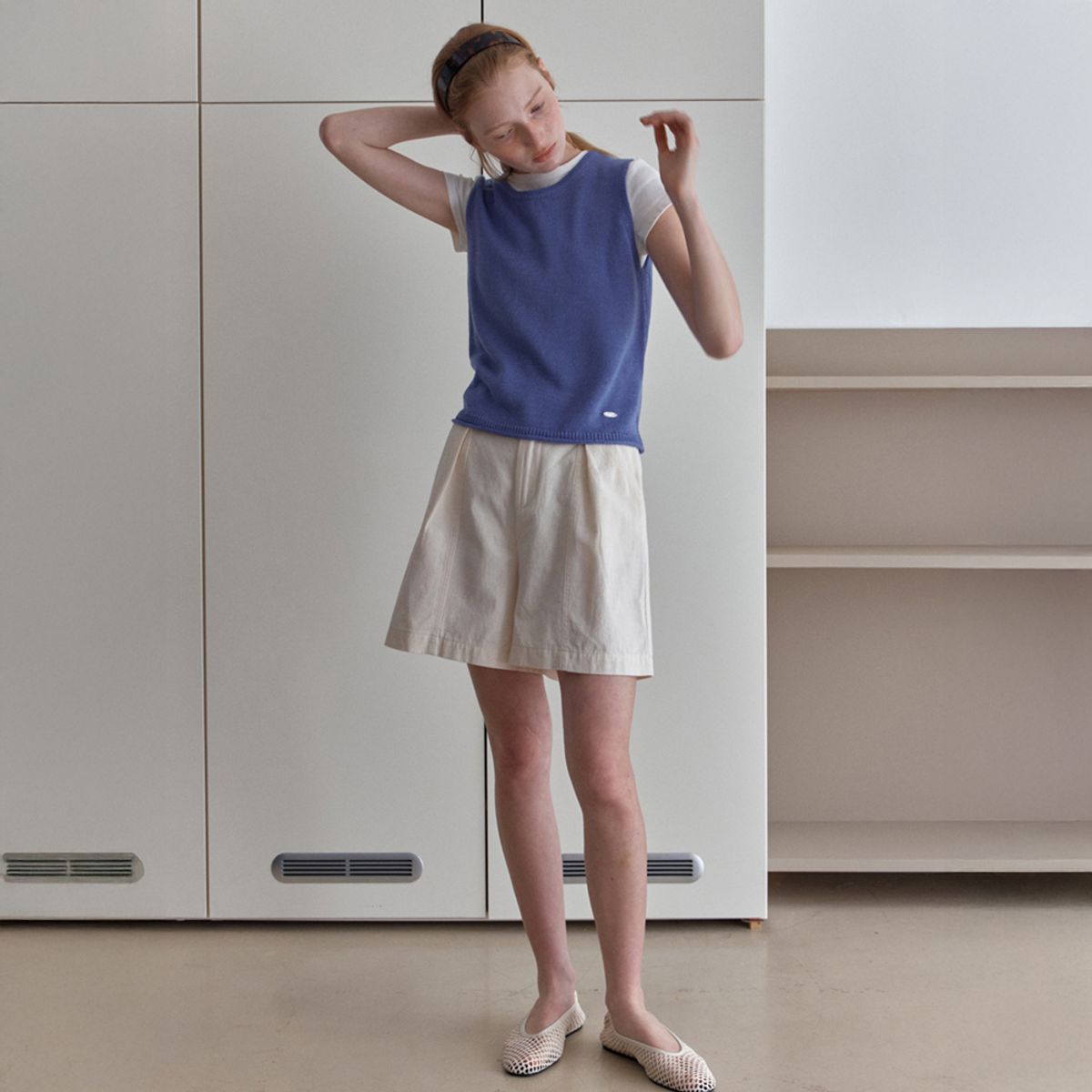 엘씨브이(LCVE) DIAGONAL BUTTONS SLEEVELESS KNIT_BLUE