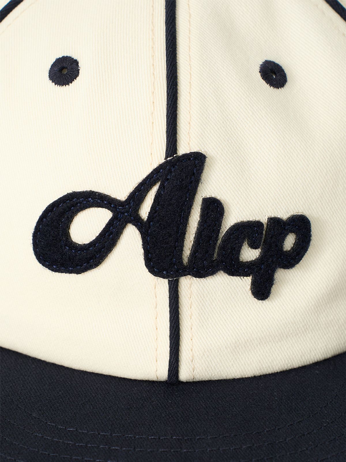 올인컴플리트(ALLINCOMPLETE) ALCP 라인 파이핑 캡 (네이비 & 아이보리)