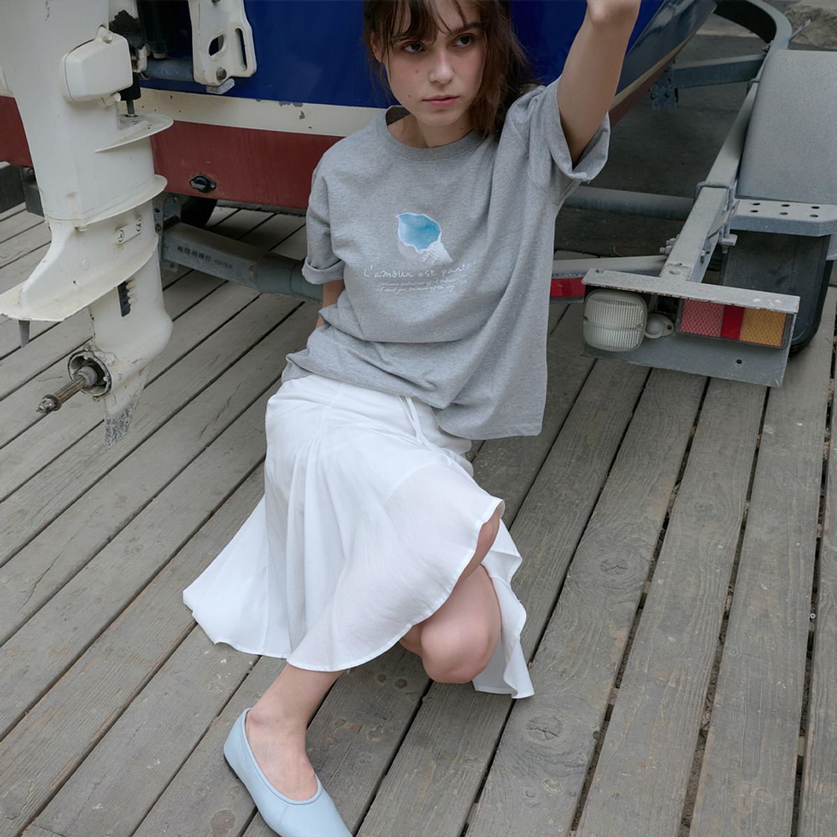 엘씨브이(LCVE) ASYMMETRIC FLARE SKIRT_WHITE