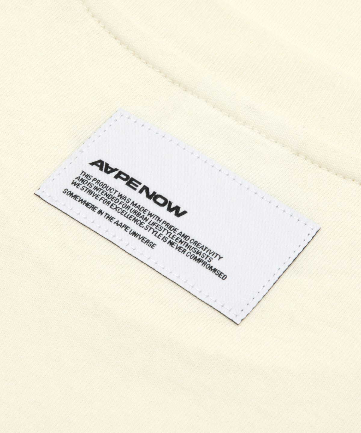 에이프(AAPE) AAPENOW AAPE 하트 롱슬리브 티셔츠 아이보리 / AAPLTM1815XXQIVA