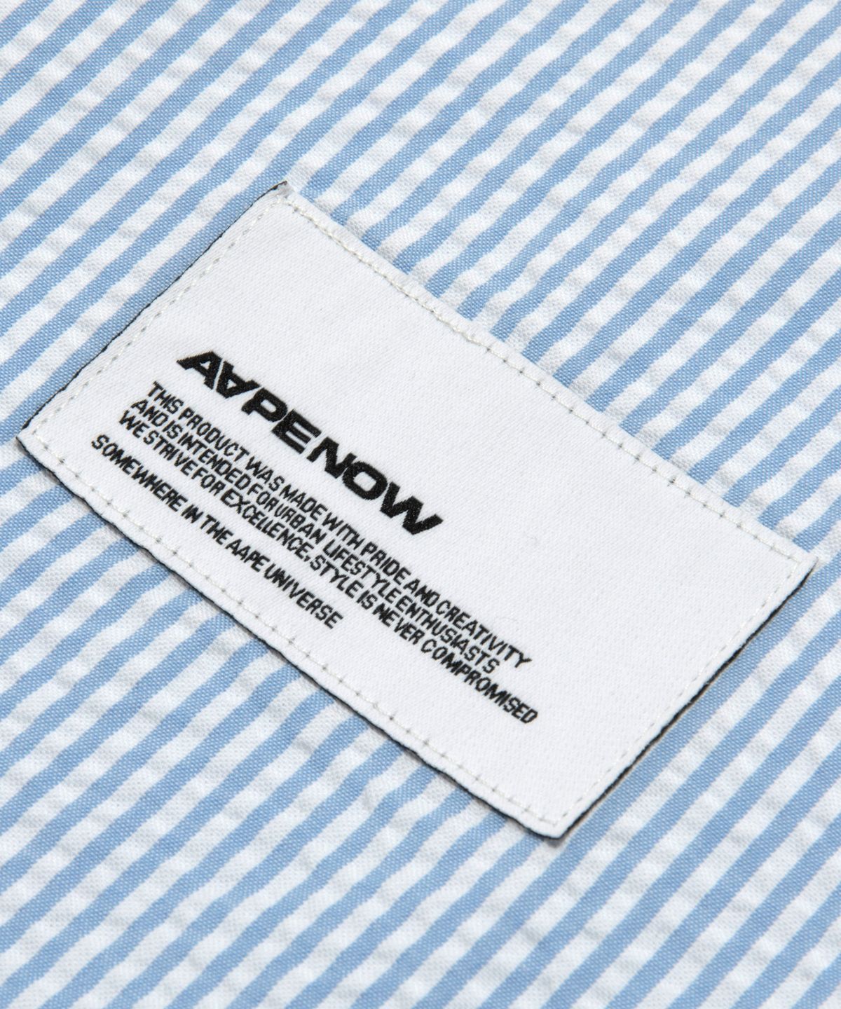 에이프(AAPE) AAPENOW 문페이스 숏 슬리브 셔츠 스카이 블루 / AAPSRM8562XXQBLA