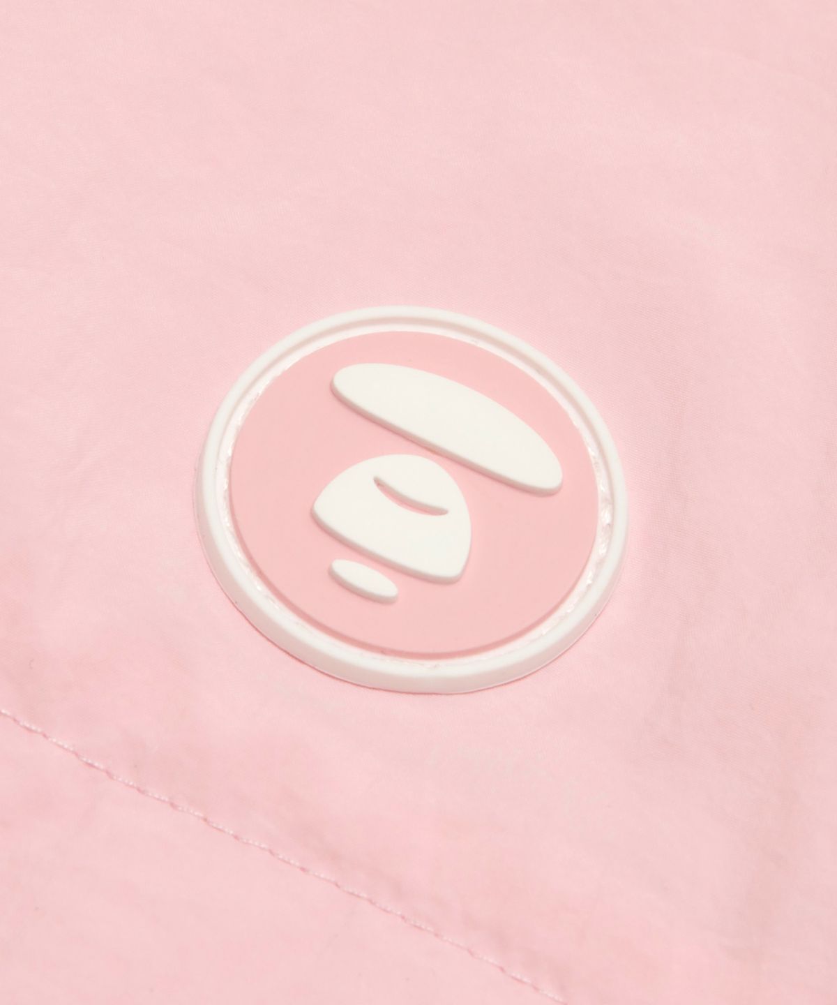 에이프(AAPE) AAPENOW 문페이스 윈드브레이커 핑크 / AAPLJM7770XXQPKL