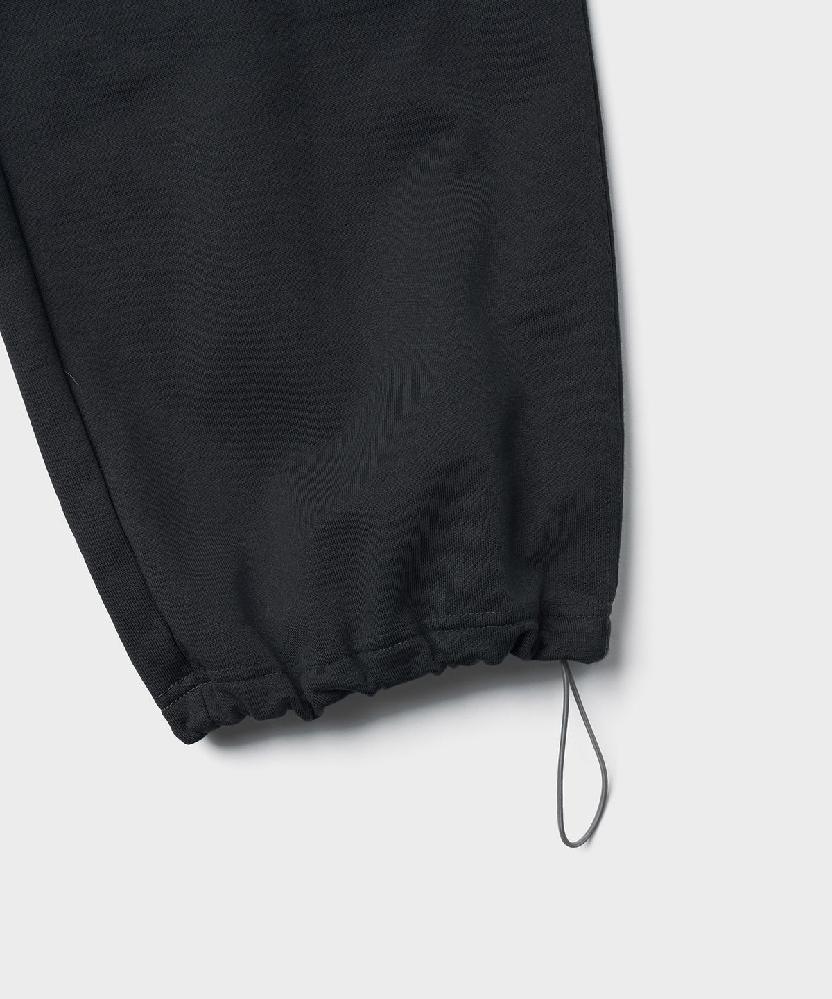 튜드먼트(TTUDEMENT) TT LOGO SWEATPANTS_CHARCOAL