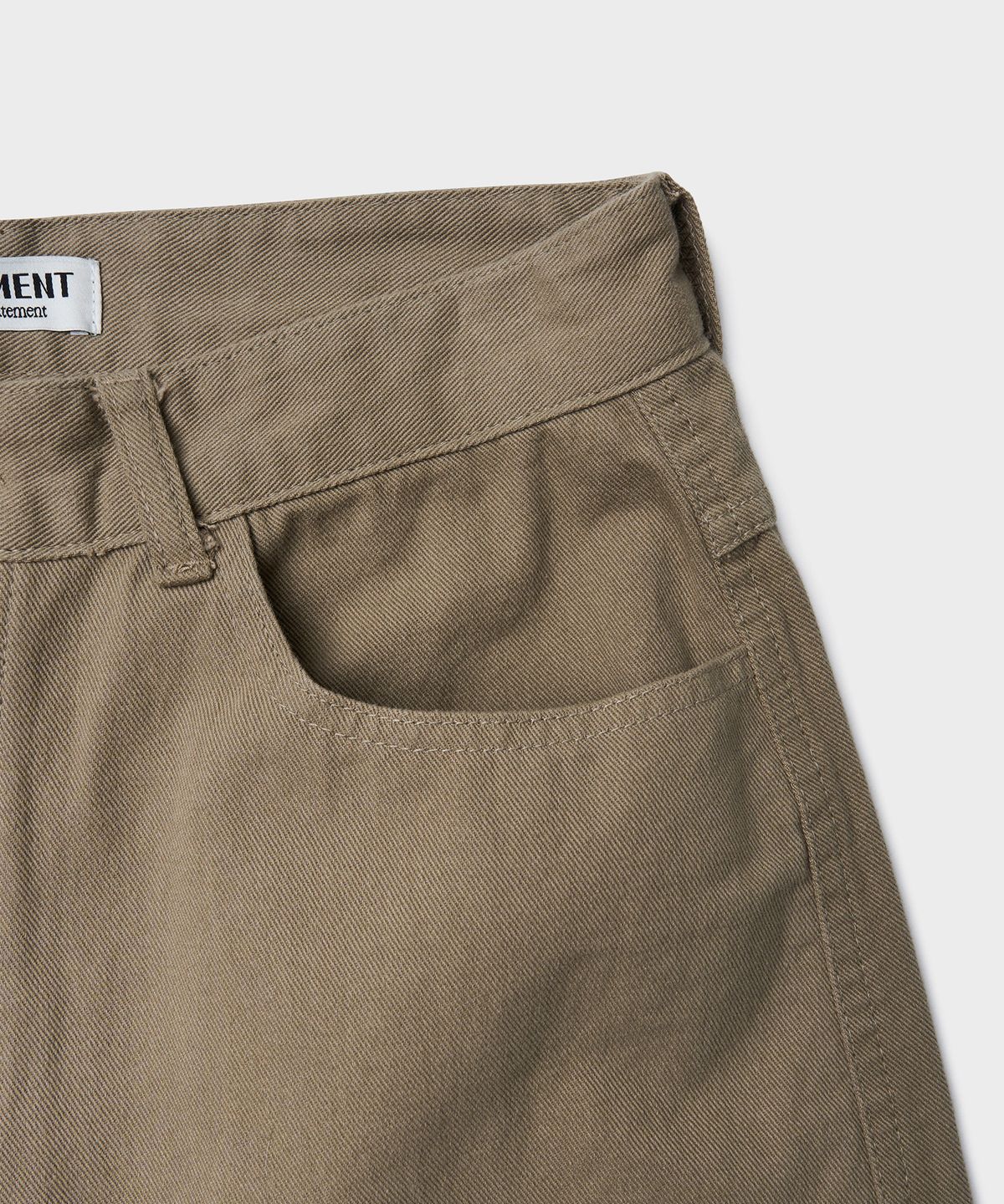 튜드먼트(TTUDEMENT) COTTON CURVED PANTS_BEIGE