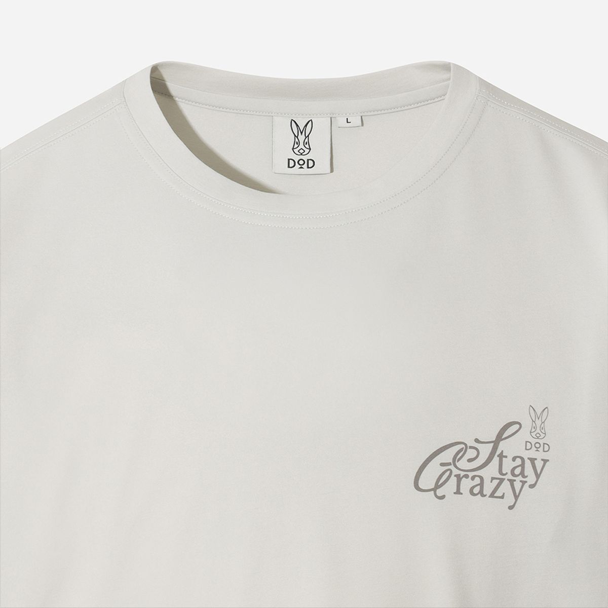 디오디(DOD) 레터링 그래픽 긴팔티셔츠(IVORY)